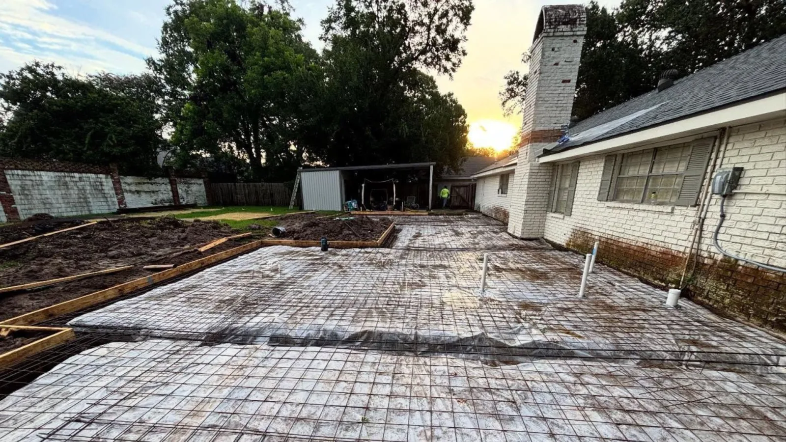 Formed and steel-reinforced foundation ready for a concrete pour at a new home build in Lafayette, Louisiana